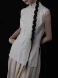 Beige pinstripe chinese cheongsam top with classic cheongsam collar, sleeveless design, and side slit detail, a minimalist cheongsam style top for daily and formal wear.