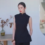 Black chinese qipao top with classic mandarin collar, sleeveless pinstripe design, and functional side pockets, a versatile top qipao for daily and formal wear.