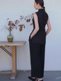 Full back view of a black pinstripe chinese qipao top, featuring a high mandarin collar and sleek tailored fit, a timeless top qipao for everyday styling.