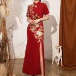 Chinese red wedding qipao full view, featuring elegant floral embroidery, high slit skirt, and form-fitting silhouette for modern bridal wear.