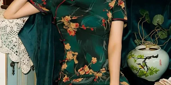 Elegant Old Shanghai short sleeve long cheongsam with green floral print, vintage-inspired look