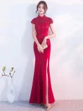 Elegant red wedding qipao with intricate lace bodice, high slit skirt, and classic mandarin collar, a premium choice for modern brides seeking traditional Chinese bridal style.