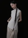 Full side silhouette of a beige pinstripe cheongsam collar top, showcasing the elegant tailored cut, side slit detail, and classic high mandarin collar of this cheongsam style top.