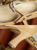 Detail shot of 1920s vintage beige genuine leather qipao Mary Janes, showing branded insole and elegant block heel with brown contrast trim.