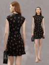 Dual view of a woman in a black rose print sleeveless short qipao dress, showing the front silhouette with mandarin collar and the clean back zipper design.