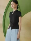 Side profile shot of a black chinese mandarin collar frog buttons qipao top, a form-fitting modern qipao inspired top showing the traditional button placket and side ruching detail.
