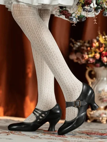 Black genuine leather 1920s vintage Mary Jane cup heel high heel shoes, paired with lace tights and retro dress, ideal for cheongsam or vintage-inspired looks