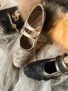 Black and gold jacquard qipao shoes display, Republic of China vintage cheongsam kitten heel shoes with floral and geometric brocade patterns