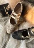 Black and gold jacquard qipao shoes display, Republic of China vintage cheongsam kitten heel shoes with floral and geometric brocade patterns