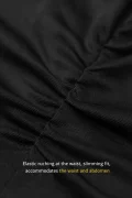 Close-up detail shot of the elastic ruching on a black modern qipao inspired top, showcasing the stretch fabric and slimming design of this form-fitting qipao top.
