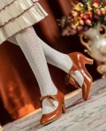 Vintage style genuine leather qipao shoes, 1920s-inspired brown ribbon mary jane heels worn with lace socks and retro dress, featuring a classic butterfly ribbon detail for elegant cheongsam and lolita outfits
