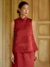 Burgundy Modified Qipao - Close-up of the mandarin collar and diagonal frog buttons on the sleeveless brocade top from the two-piece qipao with pants set, showcasing intricate fabric details and elegant design