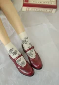 Burgundy Red Margarita 1920s Vintage Schoolgirl Style Leather Qipao Shoes worn with floral-printed white socks, perfect for pairing with cheongsam or vintage-inspired outfits.