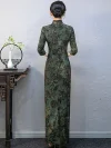 Back view of custom long Momo qipao with 3/4 sleeves, showing the full length and elegant silhouette of the traditional Chinese dress with vintage green print.