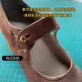 Exquisite double stitching and piping detail on 1920s replica cheongsam leather shoes, fine craftsmanship