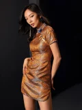 Side profile view of form-fitting orange gold qipao dress with traditional frog buttons, short-sleeve modern chinese qipao showing elegant hourglass silhouette.