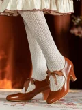 Side view of vintage style genuine leather qipao shoes, 1920s ribbon mary jane heels in warm brown, displayed in a classic retro setting to show the heel structure and smooth leather finish for timeless outfits