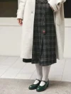Emerald green Margarita 1920s vintage schoolgirl leather Qipao shoes styled with a light wool coat and plaid midi skirt, ideal for vintage cheongsam or preppy retro everyday outfits.