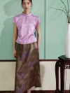 Full-body shot of a woman wearing a lavender modern Chinese mulberry silk cheongsam shirt paired with a printed midi skirt, showcasing how this versatile qipao top elevates both casual and semi-formal looks.
