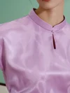 Close-up of the water drop cutout stand collar on a lavender women's modern Chinese mulberry silk cheongsam shirt, featuring a traditional fabric-covered frog button for this elegant qipao top.
