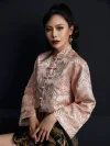 Close-up detail shot of the misty pink modern jacquard short qipao top, focusing on the traditional frog buttons, mandarin collar, and intricate wave jacquard pattern; premium modern cheongsam top with delicate craftsmanship