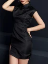 Three-quarter view of a woman wearing a modern fashion black jacquard short cheongsam, showcasing the intricate geometric jacquard pattern and sleek bodycon fit of this elegant short cheongsam.