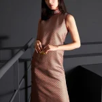 Modernized Chinese Caramel Jacquard Midi Qipao Dress - Sleeveless High Collar Elegant Qipao for Women, Front View of Contemporary Qipao Fashion with Geometric Pattern