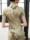 Close-up of the back of a premium mulberry silk printed midi qipao, showing the hidden back zipper, high collar trim, and intricate floral print details.