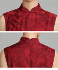 Close-up detail shot of red floral jacquard qipao dress, focusing on the mandarin collar, traditional front frog buttons, and hidden back zipper closure on this vintage chinese cheongsam.