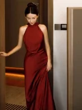 Elegant red sleeveless qipao long dress, a classic Chinese wedding qipao dress with a high neck design, tailored in premium satin for a timeless bridal style.