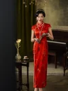 Model holding a folding fan while wearing a traditional red wedding qipao dress, showcasing the vibrant red satin and subtle floral print details.