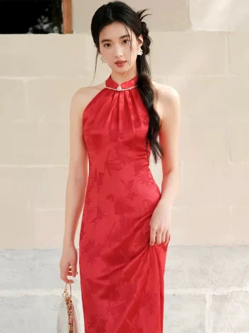 Front view of women's red mulberry silk halter neck midi qipao dress, a wedding cheongsam with pearl-trimmed mandarin collar, subtle floral jacquard, and slim fit silhouette for bridal occasions