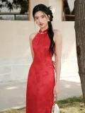 Upper body close-up of women's red mulberry silk halter neck midi qipao dress, highlighting the elegant halter mandarin collar, pearl trim, and subtle floral jacquard on the smooth mulberry silk fabric for weddings