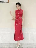 Full-body shot of women's red sleeveless summer cheongsam dress, modern wedding qipao with teardrop mandarin collar, floral & butterfly embroidery, and side slit design for elegant bridal events