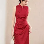 Slim fit long red wedding cheongsam with traditional golden frog buttons, sleeveless satin jacquard Chinese bridal dress for wedding photoshoot