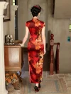 Back view of a woman in a high-end mulberry silk cheongsam dress with red and yellow floral print, walking down a vintage staircase. The classic high collar and tailored back design showcase the intricate details of this yellow-accented cheongsam.