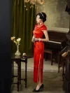 Side view of a traditional Chinese wedding red long qipao, highlighting the high side slit, satin piping, and flowing silhouette as the model poses.
