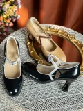Three pairs of 1920s vintage qipao Mary Janes in two color options: beige with brown contrast trim and black with white contrast trim, both crafted from premium genuine leather, displayed on lace fabric.
