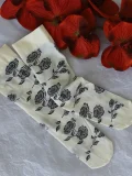 Vintage white socks with black rose print, designed to pair with qipao dresses and Mary Jane shoes, featuring delicate floral patterns for elegant retro styling