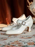 Still life shot of white genuine leather 1920s vintage Mary Jane cup heel shoes, classic retro design tailored for cheongsam and vintage styling