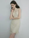 Elegant woman in a white modern stylish Chinese short cheongsam dress, posing with a thoughtful look against a plain background, showcasing the intricate lace texture, form-fitting silhouette, and delicate ruffled hem.