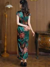 Back view of women's vintage green silk long qipao, showing the full print and elegant fit of traditional cheongsam