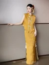 Yellow Modern Cheongsam Wedding Dress - Side view of bride in two-piece brocade cheongsam with pearl tassel frog buttons, elegant qipao silhouette for wedding photos