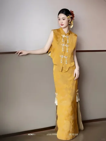 Yellow Modern Cheongsam Wedding Dress - Side view of bride in two-piece brocade cheongsam with pearl tassel frog buttons, elegant qipao silhouette for wedding photos