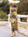 Model wearing a wide-brim straw hat, walking outdoors in a women high end yellow mulberry silk cheongsam dress with landscape print, blending retro charm with modern elegance.