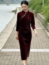 Graceful woman walks along riverside brick pavement in soft Velvet Long Sleeve Burgundy Cheongsam with side high slit and traditional frog buttons, versatile Long Sleeve Cheongsam velvet outfit suitable for daily outing and formal occasion