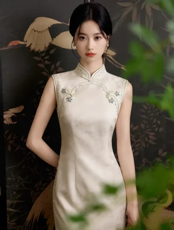 Stunning front view of a refined sleeveless white qipao dress with traditional knot buttons and mandarin collar.